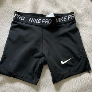 kids small nike pro- a little wear on the bottom but good condition